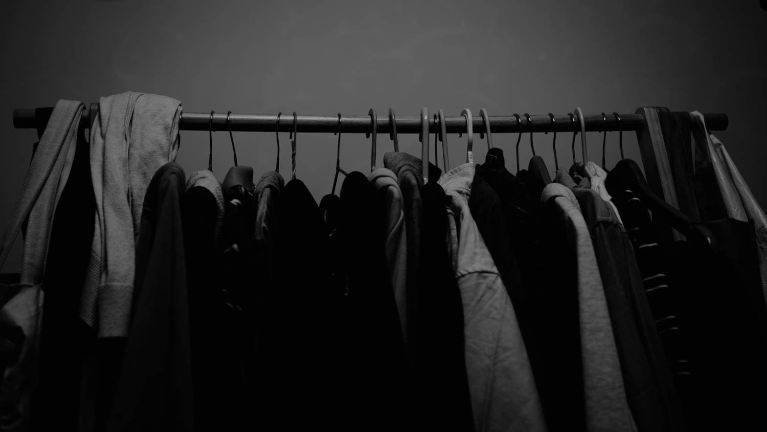 An overfilled wardrobe with many rarely worn items