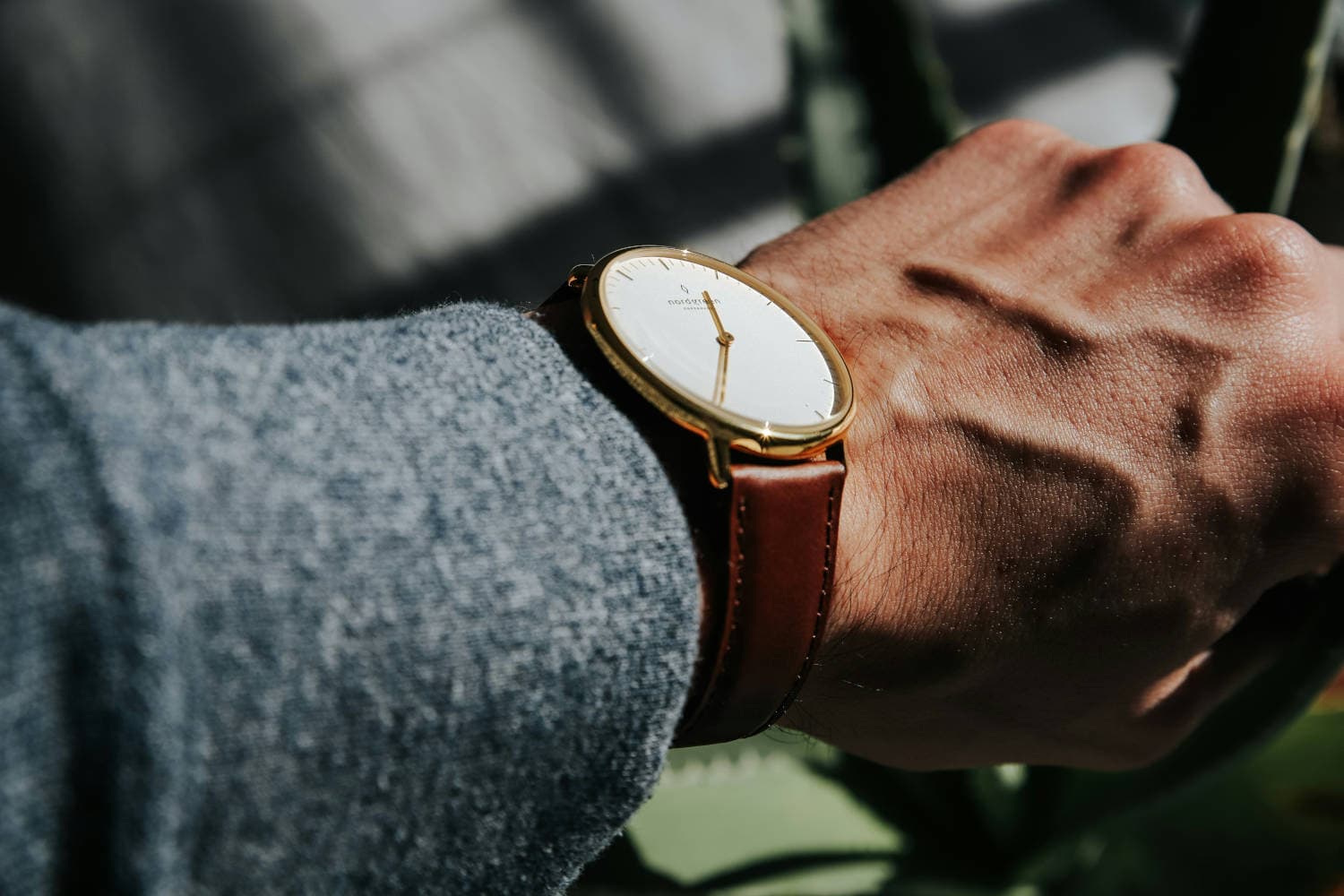 Minimal men's wrist watch with clean dial as a classic style detail
